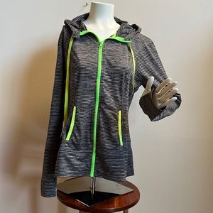 Lukka zip front jacket with neon accents and thumb opening sleeve